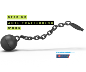Black ball and chain on a white background and a writing: Step up anti-trafficking work